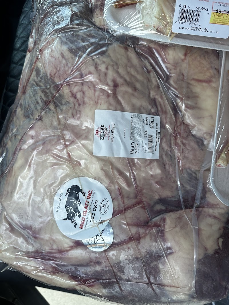 Adam's Glatt Meat Market. logo