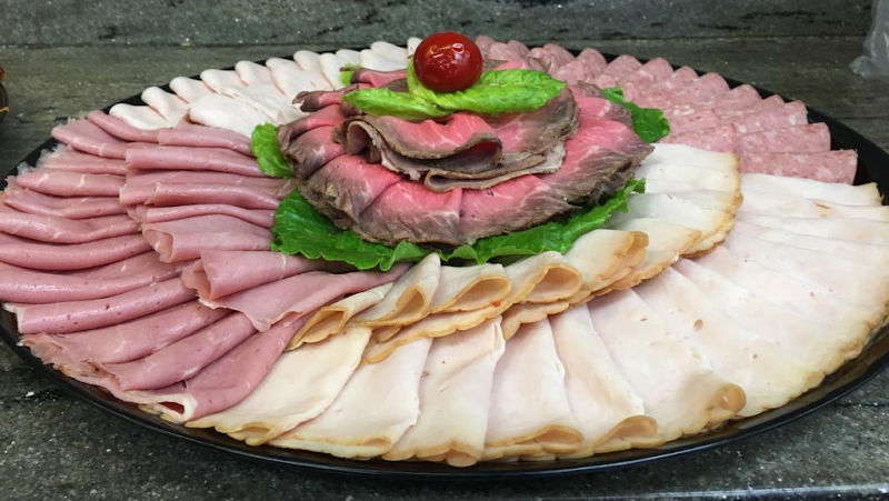 Carltun on the Bay Glatt Kosher Caterers at Temple Israel of Great Neck logo